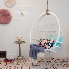 White Hanging Chair in Kid's Room