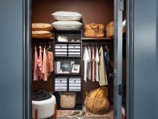 Ample shelves and storage abound in the walk-in closet with room for every item and extra space for additional pillows and bedding.