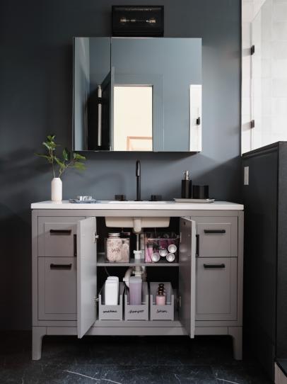 https://hgtvhome.sndimg.com/content/dam/images/hgtv/fullset/2022/8/22/5/uo22_main-bathroom-closet-vanity-styled-storage-JGMB908_v.jpg.rend.hgtvcom.406.542.suffix/1661349383819.jpeg