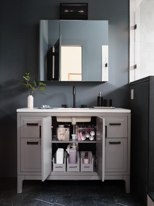 The under counter organization system in the main bathroom vanity provides room for every item while still feeling stylish.
