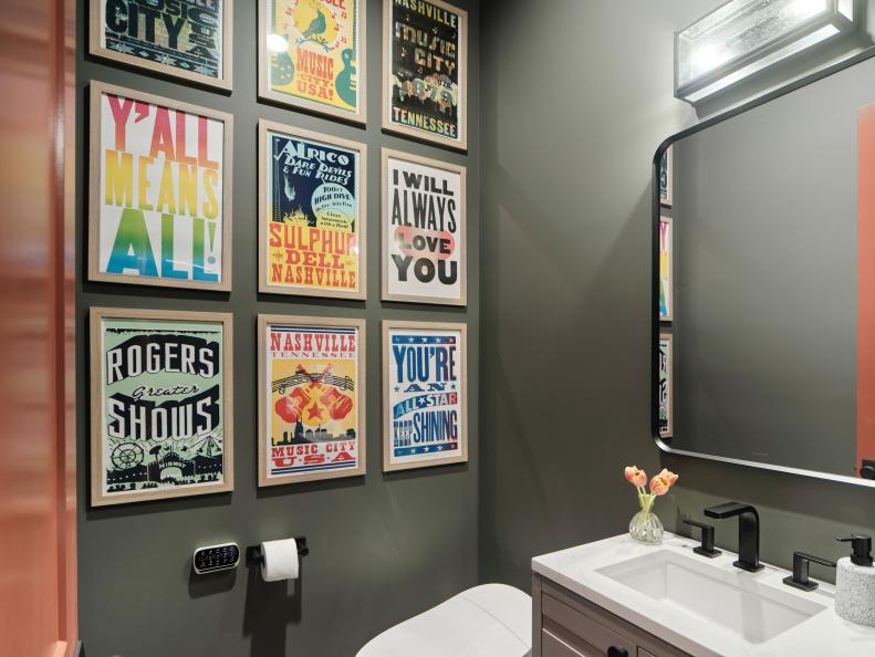 Wall art from legendary local Nashville print shop Hatch Show Print makes a big design statement and adds tons of local flavor to this simple and stylish powder room.