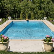Rectangular Pool With Two-Tone Stained Concrete Patio