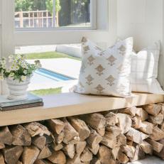 Neutral Contemporary Window Seat With Pillows and Firewood 
