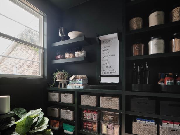 The weekly grocery list can be written on the wall mounted roll of paper in the pantry while a small counter space adds room to pack lunches and head out the door.