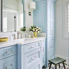 Blue and White Bathroom With Fun Floor Tiles