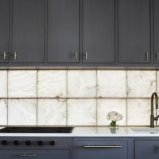 Gray Modern Kitchen With Alabaster Backsplash