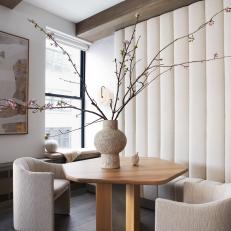 Modern Neutral Dining Room With Fluted Banquette