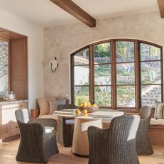 Neutral Contemporary Mediterranean Breakfast Room With Arched Window
