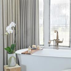 Soaking Tub and White Orchid