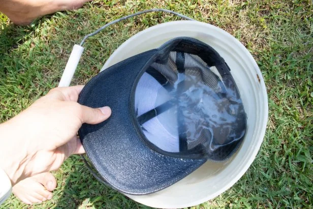 Cleaning a dirty baseball cap so that the fabric lasts longer.