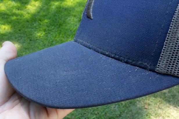 Cleaning a dirty baseball cap so that the fabric lasts longer.