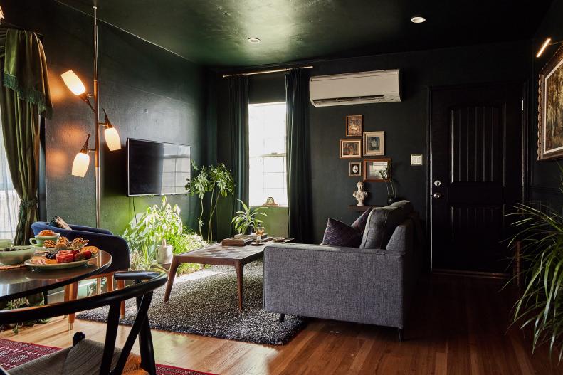 Black Living Room With Gray Sofa, Comfy Rug and Floor Lamp