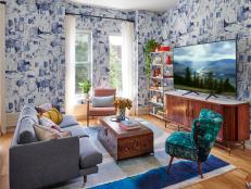 Eclectic Living Room With Blue Wallpaper