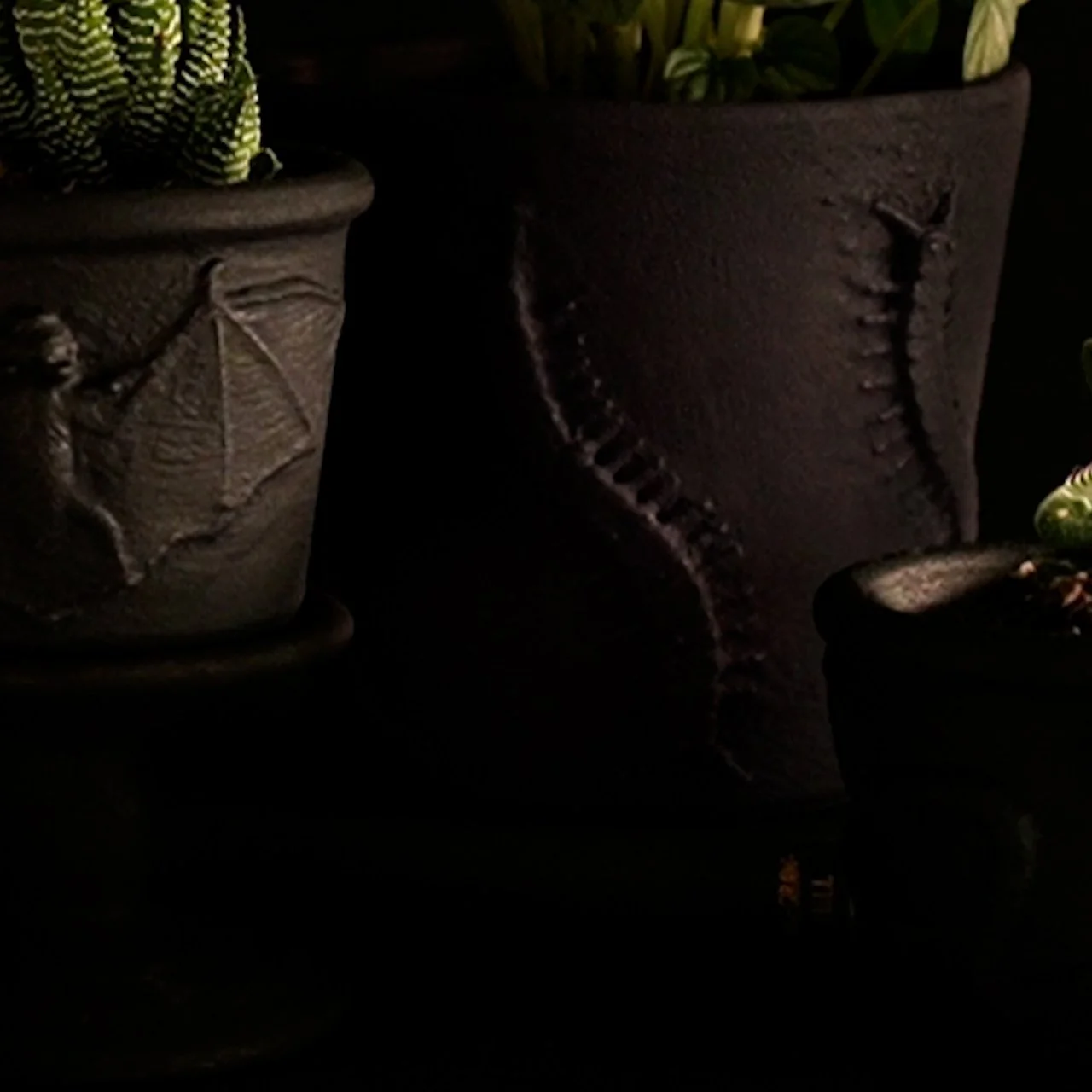 How To Use Toy Spiders and Bats to Craft an Embossed Planter for Halloween | HGTV