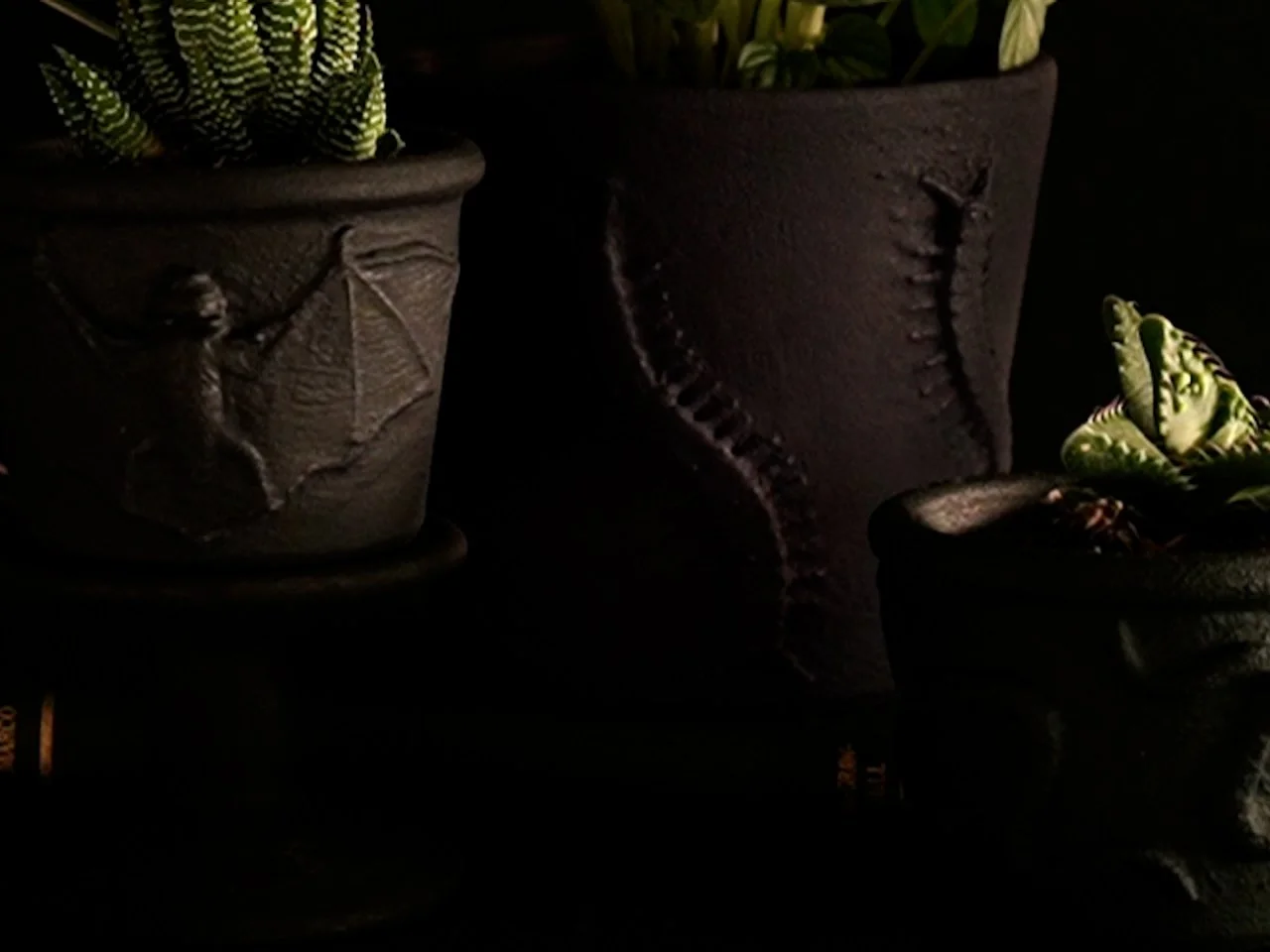 How To Use Toy Spiders and Bats to Craft an Embossed Planter for Halloween | HGTV
