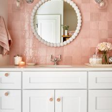 Pink Transitional Kids' Bathroom With Candle