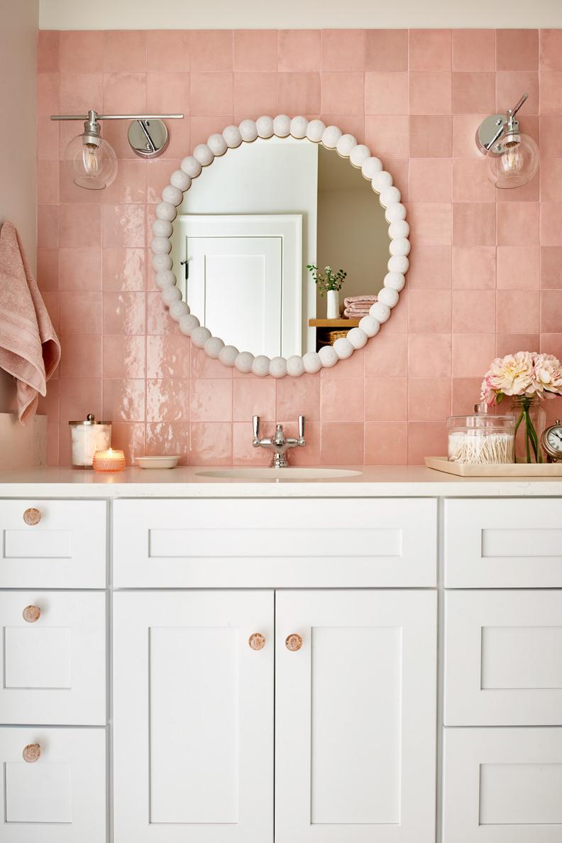 Pink Kids' Bathroom With Candle