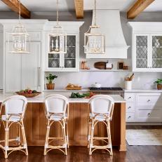 White Transitional Chef Kitchen With Wood Island