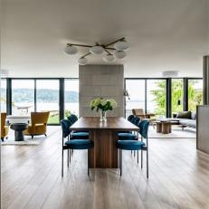 Modern Open Plan Dining Area With Blue Chairs