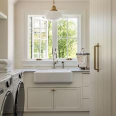 White Country Laundry Room With Farmhouse Sink