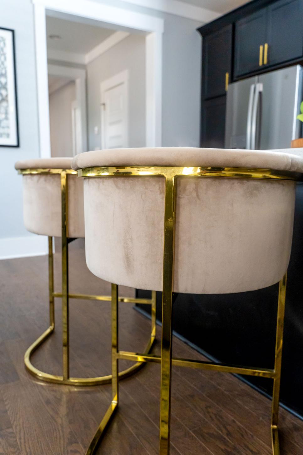 Shiny Gold Accents on Neutral Barstools HGTV