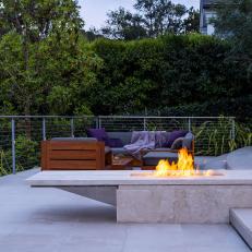Fire Pit and Gray Outdoor Sofa