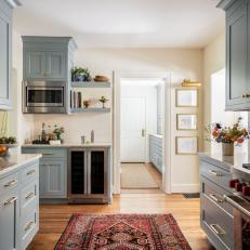 Blue Transitional Kitchen With Red Rug