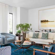 Blue Transitional Living Room With Vintage Table