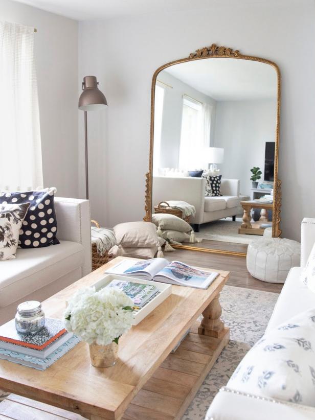 White Living Room With an Embellished Mirror
