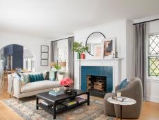 Living Room With Blue Tiled Fireplace
