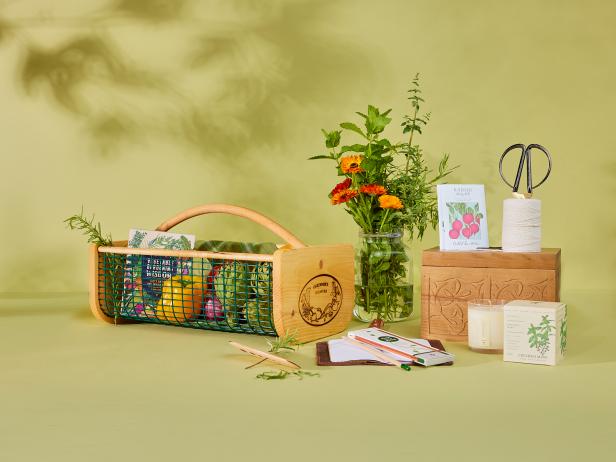 assortment of gifts for gardeners on green backdrop