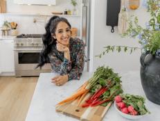 Veronica Valencia shows off a smile in the kitchen pre-reveal