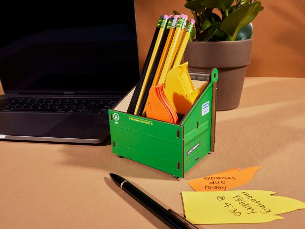 Green dumpster pencil holder with flame-shaped notecards