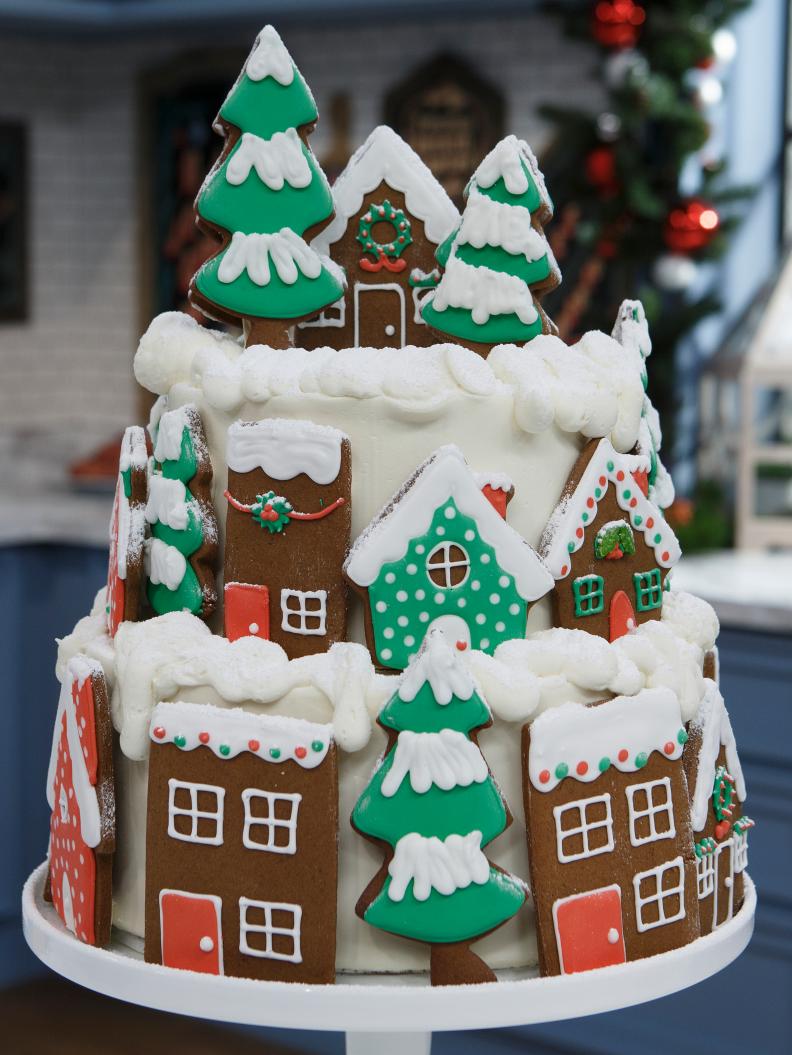 Josh Snyder and Angela Kinsey's Gingerbread House Cookie Cake is displayed as seen on The Kitchen, Season 15.