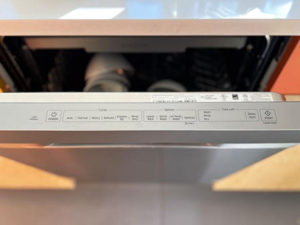 Dishwasher cycle settings on the side of an appliance.