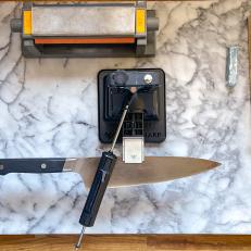 Work Sharp Precision Adjust Knife Sharpener Holding a Knife