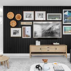 Black Sitting Room With Gallery Wall