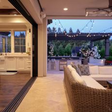Living Room and Deck With String Lights