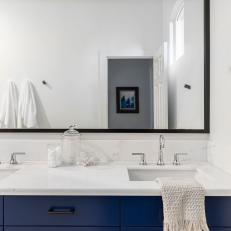 White Bathroom With Blue Vanity