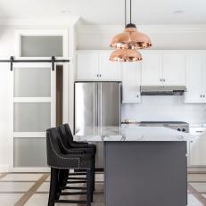 White Modern Kitchen With Copper Pendants