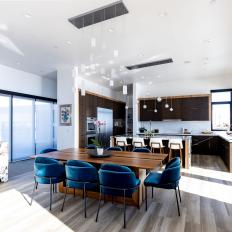 Modern Neutral Dining Room With Blue Chairs