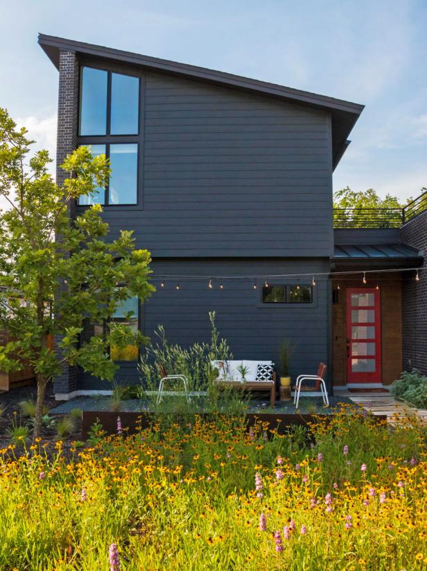 This eco-friendly front yard from HGTV magazine features a mix of wildflowers and plants instead of traditional grass.