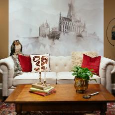 Near Floor to Ceiling Mural of Hogwarts Castle Behind Tufted Sofa