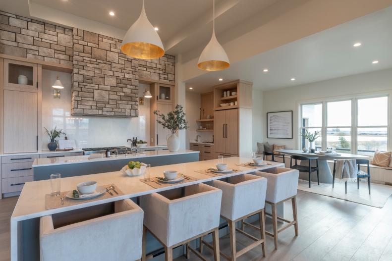Team Bryan and Sarah Baeumler's finished kitchen features a double island and a Colorado-inspired Design Surprise stone covered hood vent, as seen on Rock the Block, Season 4. (After, loosely-wider Matches Kitchen Before 0005)



