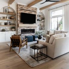 Neutral Transitional Living Room With Arched Shelves