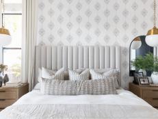 Gray Bedroom With Brass Pendants