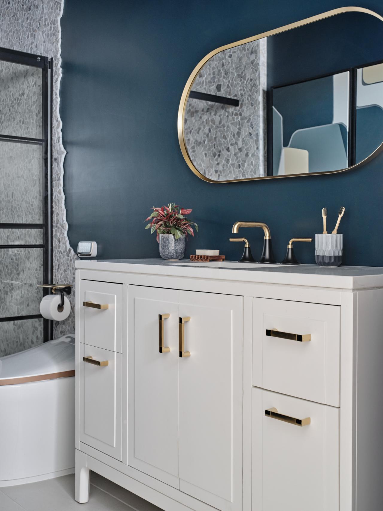 https://hgtvhome.sndimg.com/content/dam/images/hgtv/fullset/2023/3/2/02/sh23_guest-bathroom-vanity-mirror-JGMB0987_v.jpg.rend.hgtvcom.1280.1707.suffix/1677769055530.jpeg