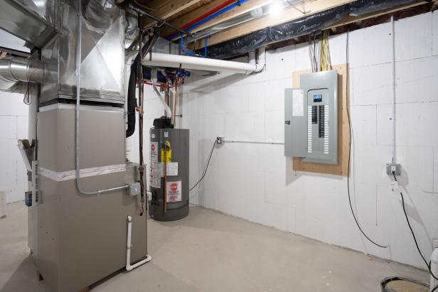Detroit, Michigan -USA- January 12, 2023: home has been updated with a new furnace, hot water tank and electrical panel installed in the basement