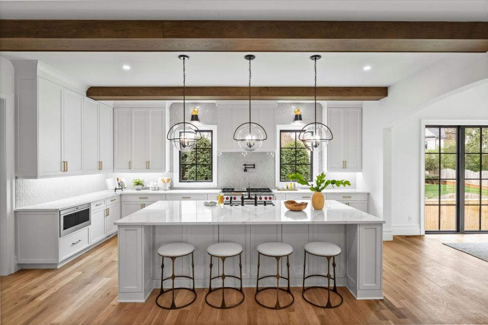 White Chef Kitchen With Wide Beams
