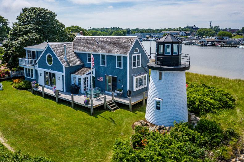 Blue Cape Cod House and Lighthouse